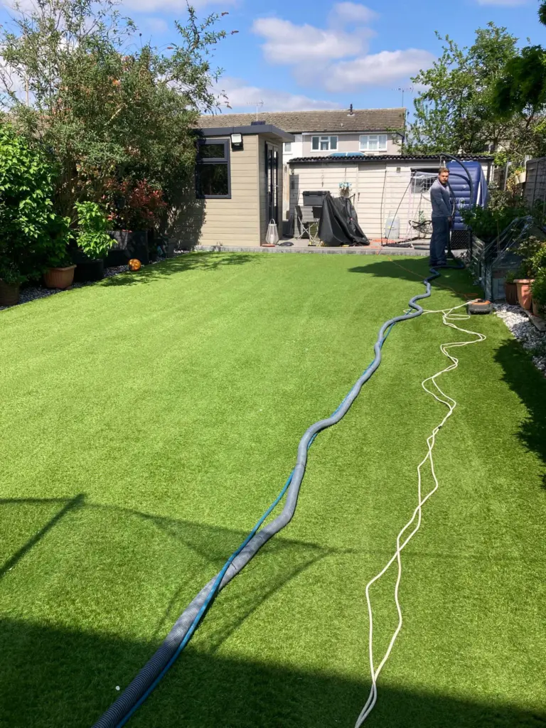 artificial-grass-cleaning-dog-urine-odour-removal-essex